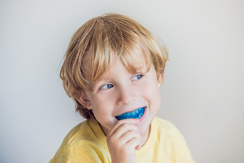 should-my-child-wear-a-mouthguard-protecting-your-childs-teeth-strip1